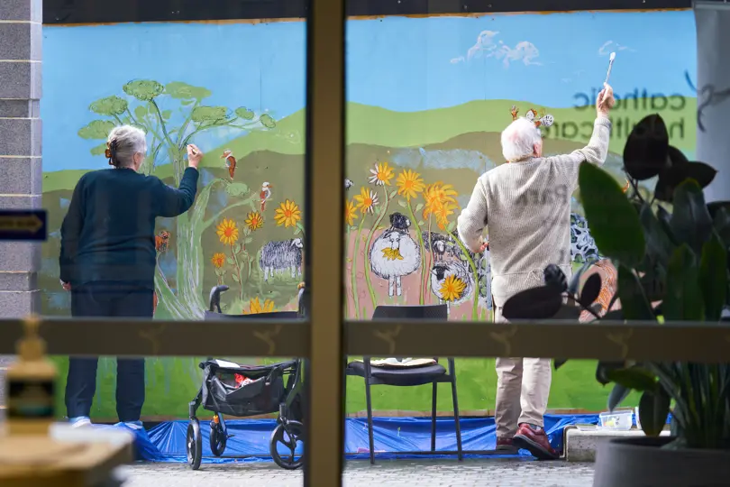 Residents working on the mural 2.jpg