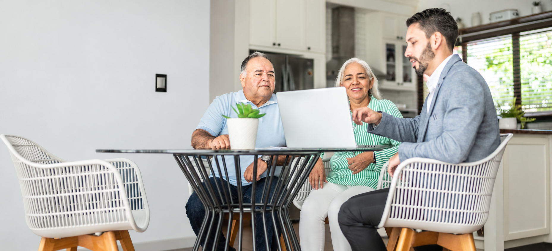 Bright Kitchen Consultation with Laptop.png